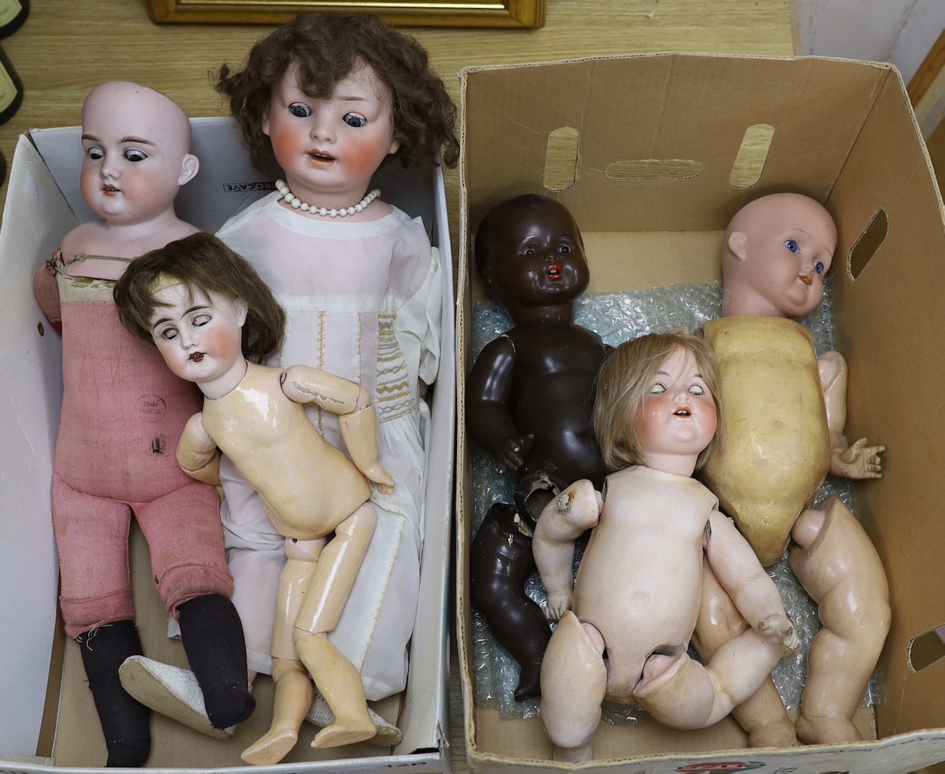 A collection of six 19th and 20th century various dolls